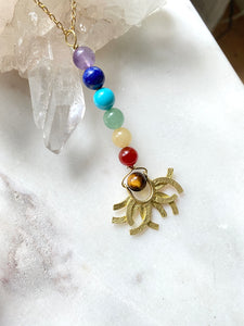 Chakra stones gold necklace-side view