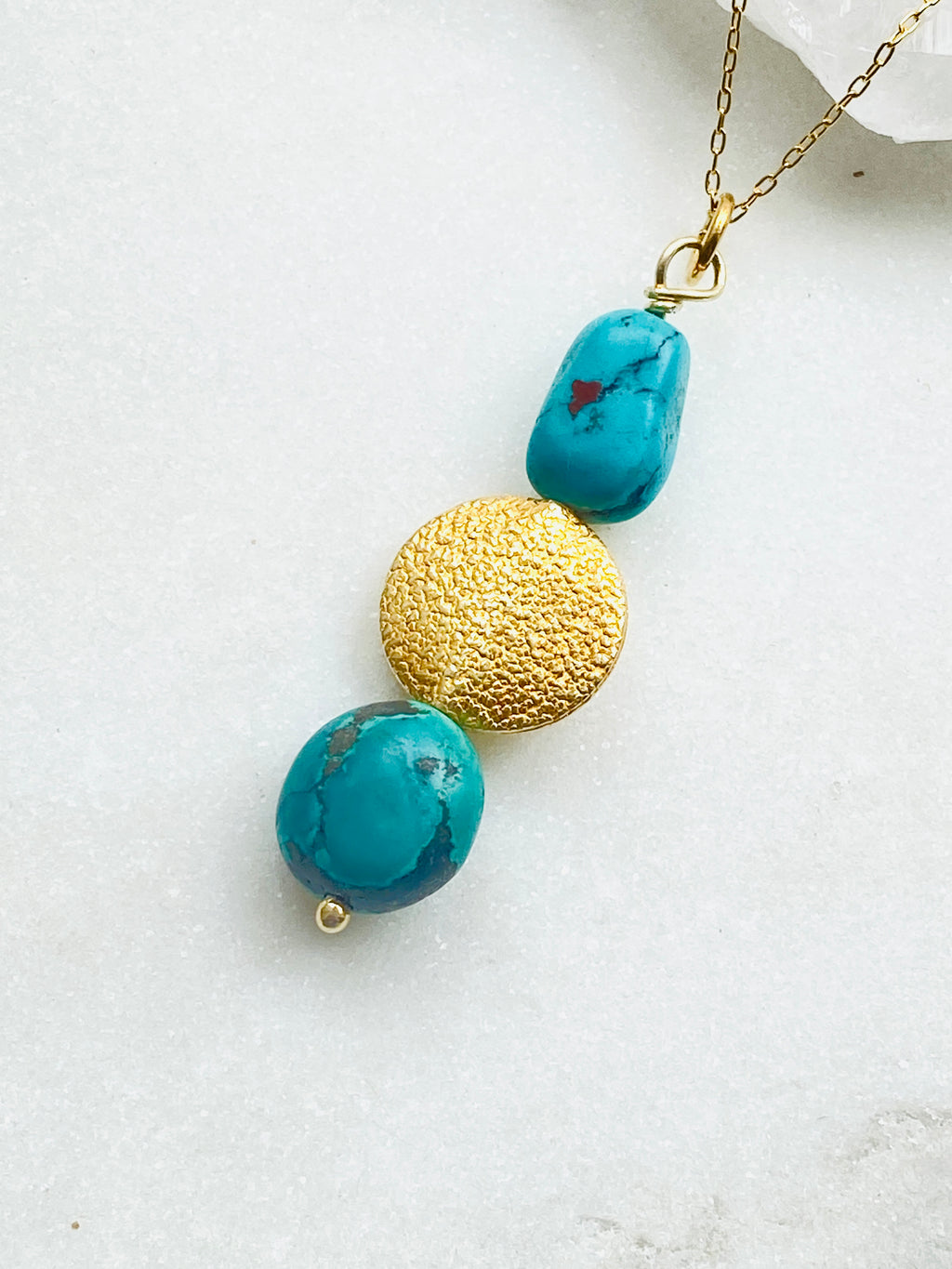 Turquoise Gold Necklace (Gold On Silver), with gold decoration between two turquoise stones. Handmade in London.