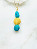 Turquoise Gold Necklace (Gold On Silver), with gold decoration between two turquoise stones. Handmade in London.