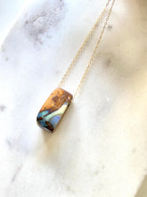 Load image into Gallery viewer, Boulder opal with goldfilled chain. Side view. Handmade by full moon designs.