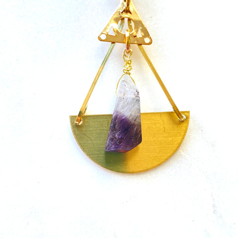 Purple amethyst with brass.
