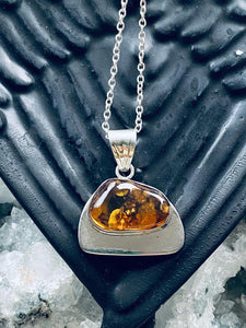 Natural Amber Sterling Silver necklace by Full Moon Designs.