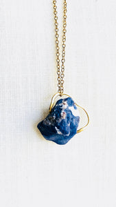 sodalite gold necklace by full moon designs blue gemstone pendant close up