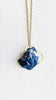 sodalite gold necklace by full moon designs blue gemstone pendant close up